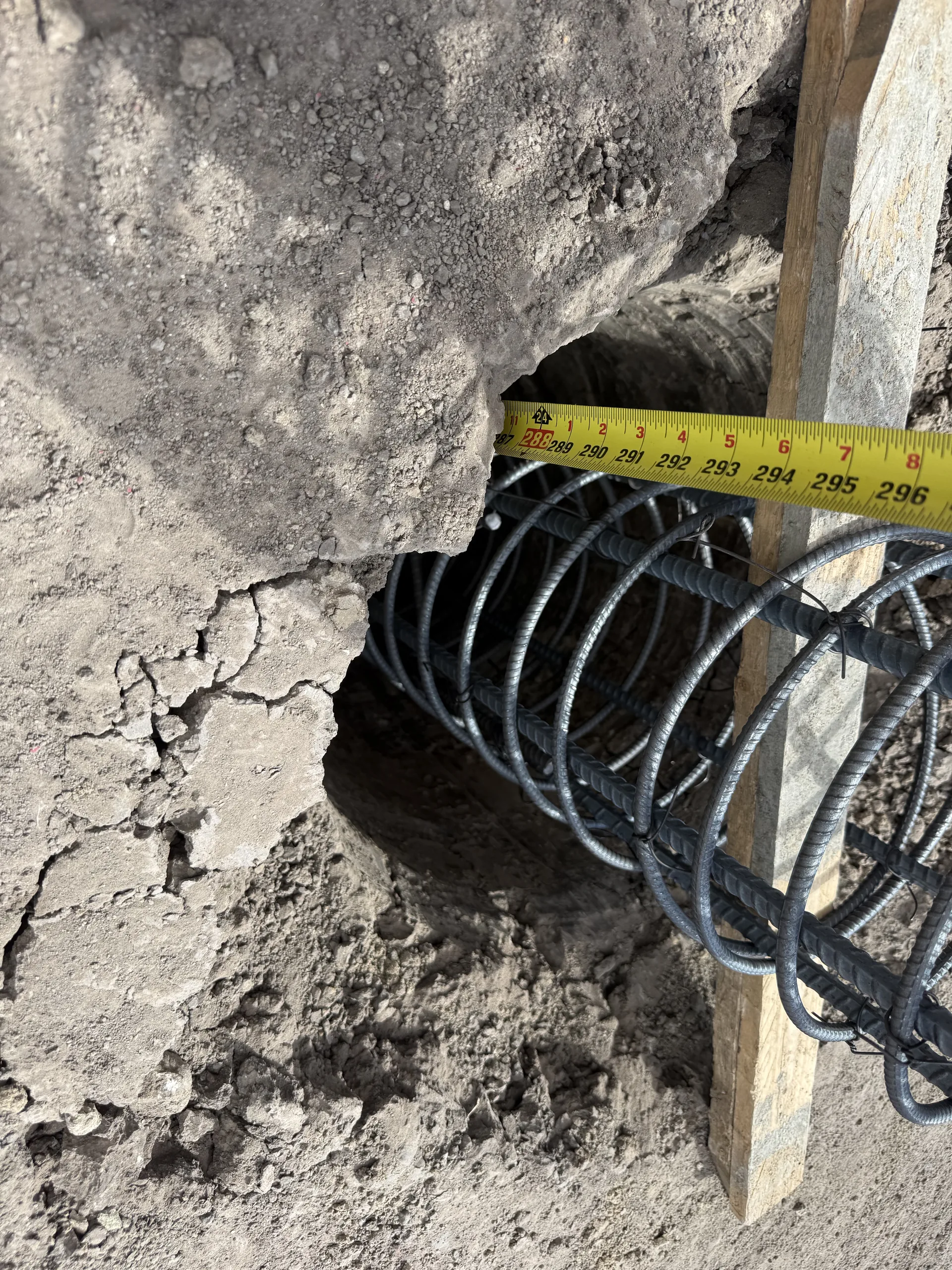 Tape measure at a drilled pier confirming its depth